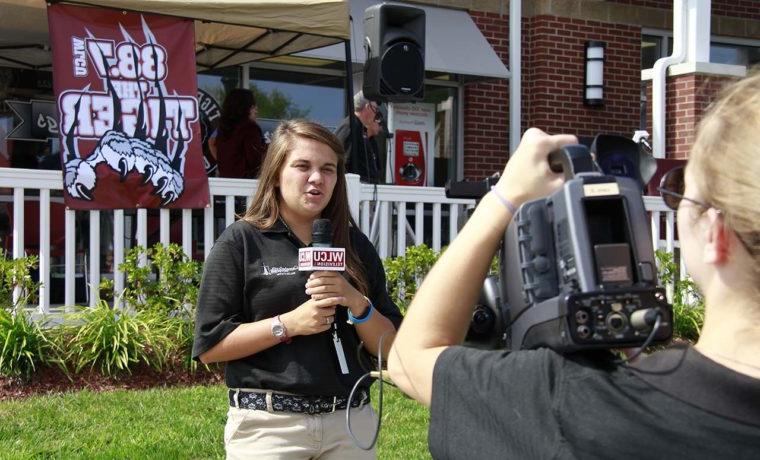 Courtni Cruse reporting on camera